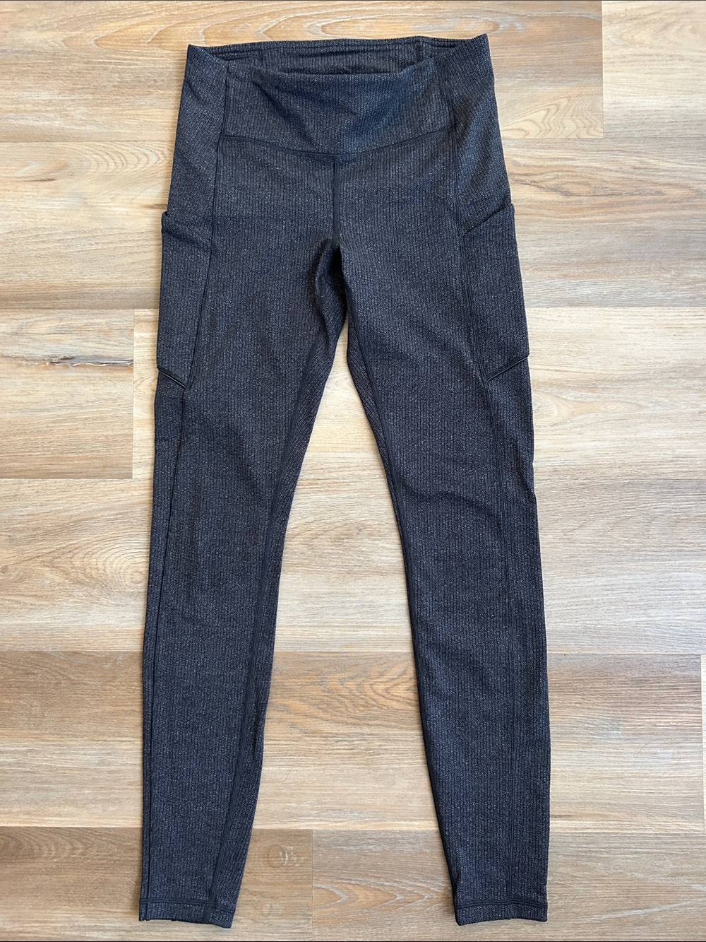 Lululemon Speed Up Tight in Heathered Black/Gray- Size 6.
